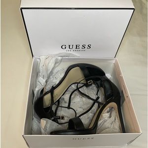 Black Guess strapped heel